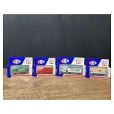 (4) 1/64 Trucks NIB