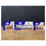 (3) 1/64 Trucks NIB