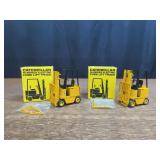 (2) 1/24 Caterpillar M Series Forklifts NIB Conrad
