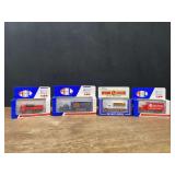 (4) 1/64 Trucks NIB