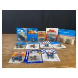 (12) 1/64 Ford NIB Ertl