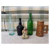 Bottle, Stein and figurine