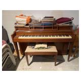 Piano, bench and music