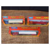 (3) 1/64 International Trucks of the World Semis NIB Ertl