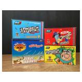 (4) 1/24 Race Cars NIB