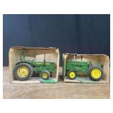 (2) 1/16 John Deere 950 + M NIB Ertl