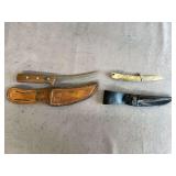 Two Fixed Blade Skinning Knives With Leather Sheaths