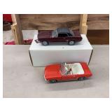 (2) 1/24 Ford Mustangs