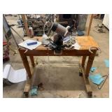 Electric Chainsaw Sharpener on Work Table with Accessories