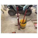 Tire Changer, Bucket with Various Hand Tools, and Bench Vises