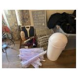 Assorted Household Items Including Bathroom Sign, Waste Basket, and Health Scale