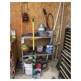 Metal Shelving Unit with Various Items