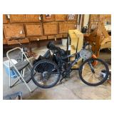 Assorted Items Including Bicycle, Folding Bed, and Igloo Cooler