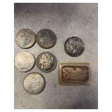 5 Morgan’s, 1 Peace and 1 Troy OZ