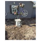 Assorted yard art and bird houses