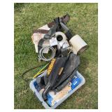 Mix of work accessories tool bags tape bungees