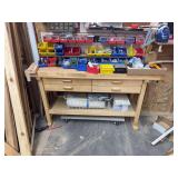 Wood working bench with large assortment of parts