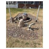 Contents of flower bed, excluding rock and retention stone