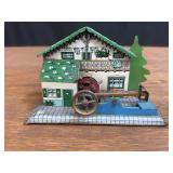 Belt-Driven Tin Hammer Toy