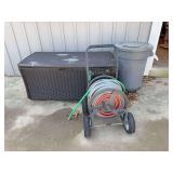 Deck Box (with contents), Hose, Trash Can