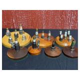 Vintage Spark Plug Display Collection on Wooden Bases
