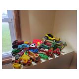 Assorted Toy Vehicles and Tractors