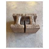 2 - 50-pound cast iron calibration weight, likely used for industrial or commercial scales.
