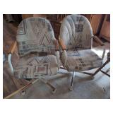 Set of Two Upholstered Rolling Armchairs with Metal Bases