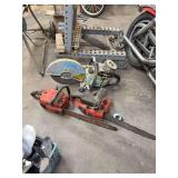 Two Chainsaws and One Grinder