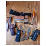 Collection of Assorted Folding and Fixed Blade Knives with Sheaths