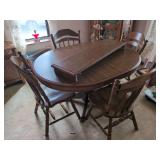 Dining Table with Four Spindle-Back Chairs