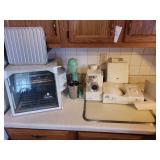 Collection of Kitchen Appliances including Ronco Rotisserie, Hamilton Beach Mixer, Meat Grinder, and Rival Slicer