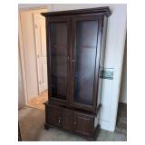 Wooden Gun Cabinet with Glass Doors and Lower Storage