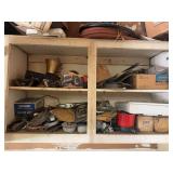 Two brand new sets of toe hooks, snap on calendars, bug killer in the box miscellaneous parts