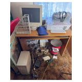 Computer desk with computer and cables