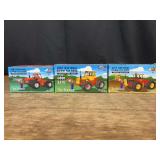 (3) 1/64 4wd Tractors NFTS NIB Ertl