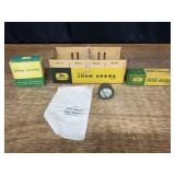 (5) John Deere Boxes, Bag, Gauge