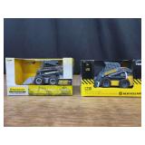 (2) 1/32 New Holland Skid Steer Loaders NIB Ertl
