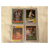 (4) Pete Rose Baseball Card Lot: 1985 Fleer Star Stickers, 1985 Topps Record Breaker, 1986 Quaker Chewy Granola Bars, and 1984 Topps All-Star Set