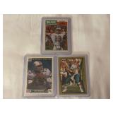 (3) Dan Marino Miami Dolphins Football Card Lot (1987 Topps #233, 1991 Upper Deck Quarterback Challenge #16, 1998 Topps #270)