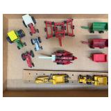(11) 1/64 Tractors + Equipment
