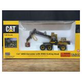 1/50 Caterpillar 580B Harvester NIB Norscot