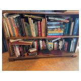 Bookshelf with Assorted Collection of Hardcover and Softcover Books