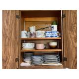 Assorted Kitchenware Collection Including Ceramic Mugs, Enamelware, and Tableware