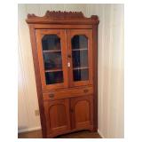Cabinet with Scalloped Crest and Cane Detail