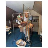 Collection of Assorted Woven Baskets and Macrame Plant Hangers on Metal Display Stand
