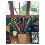 Collection of Decorative Walking Sticks and Canes