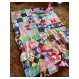 Patchwork Quilt with Multi-Patterned Fabric Squares