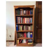 Wooden Bookcase with Assorted Books and Extra Shelves