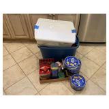 Assorted Household Storage Tins, Plastic Containers, and Kitchen Textiles